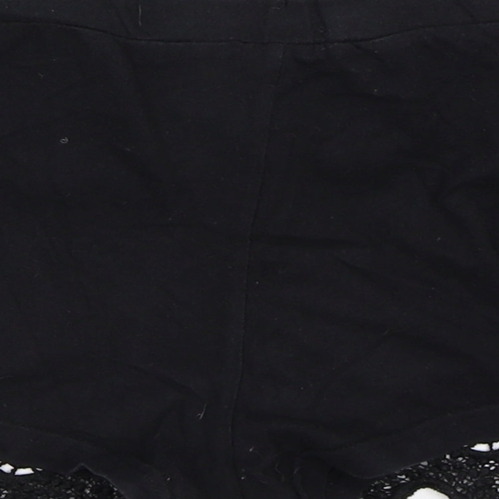 Brand and care label for Atmosphere women’s black hot pants shorts, size UK 6