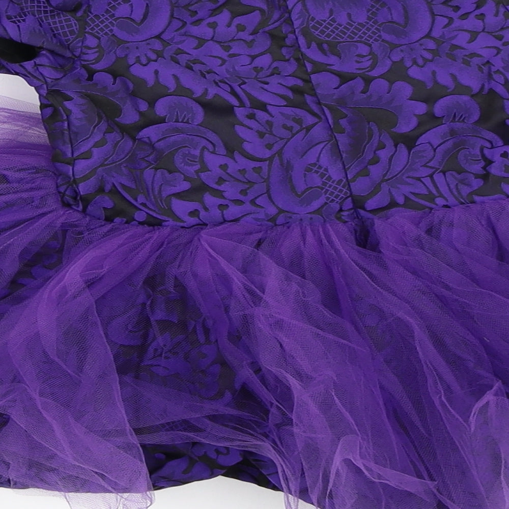 Brand and care label for Hata Baloo girls’ purple tutu dress, size 12, months