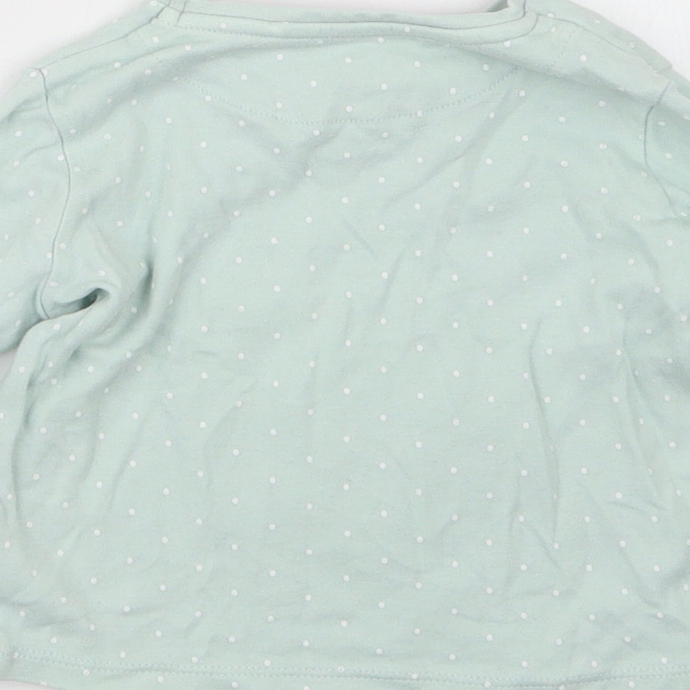 Brand and care label for Mini Club girls’ green geometric babydoll pyjama top, size 18-24, months