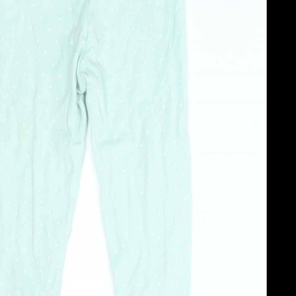 Brand and care label for Mini Club girls’ green polka dot pyjama pants, size 18-24, months