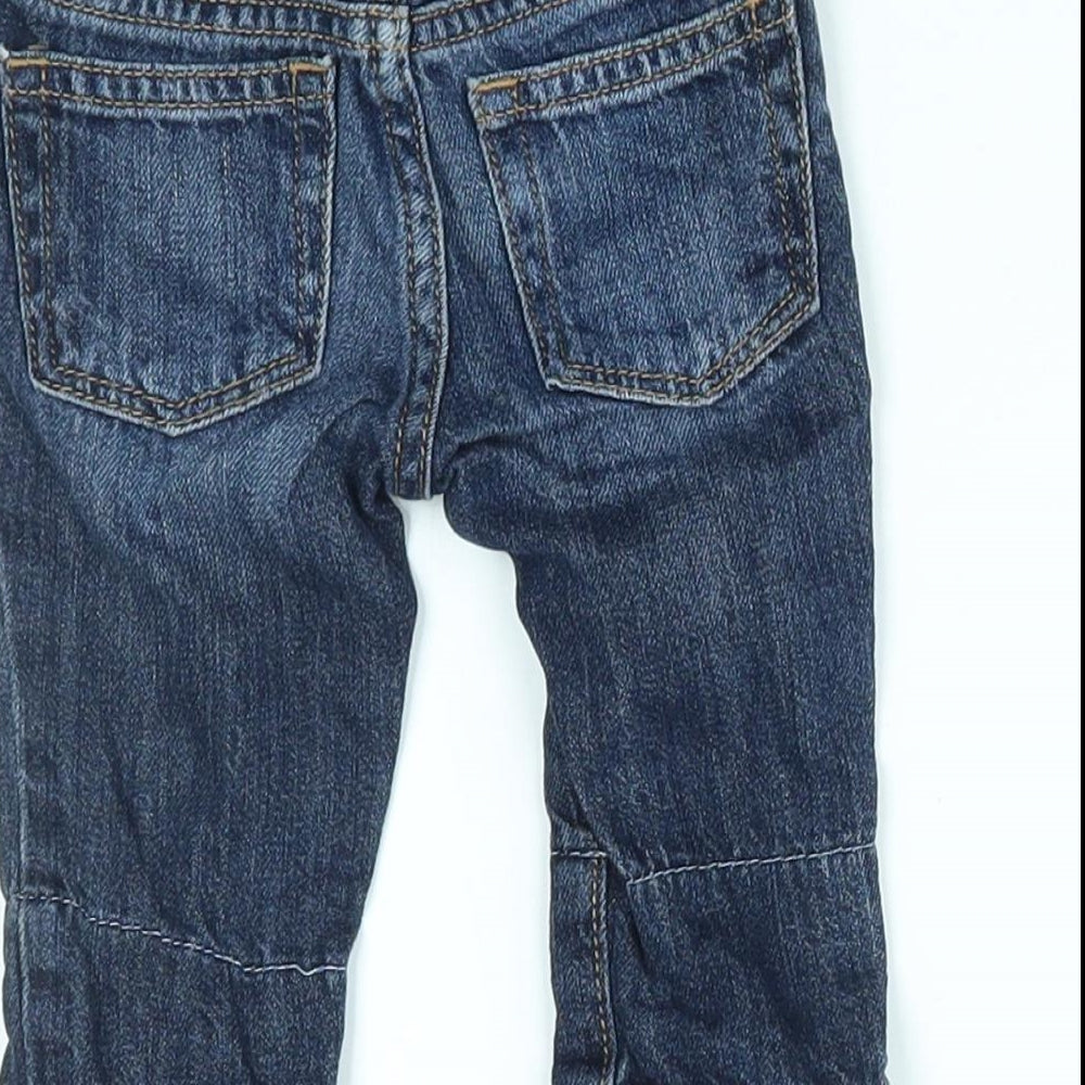 Brand and care label for Gap Baby Blue Jeans, size 0-3, Months