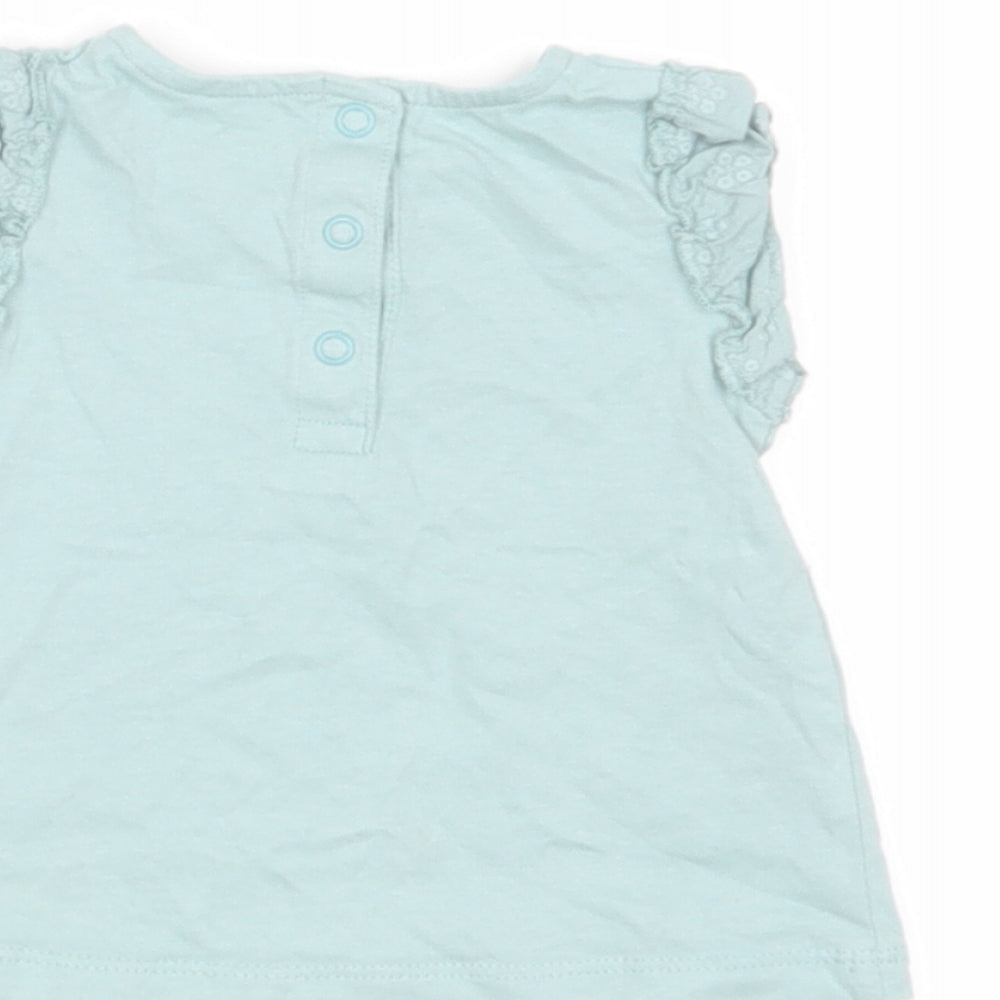 Brand and care label for Tu Baby Green Basic Blouse, size 3-6, Months