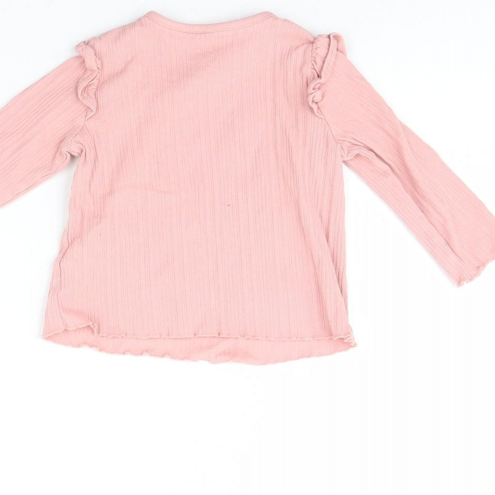 Brand and care label for F&F girls’ pink basic blouse, size 6-9, months - happy