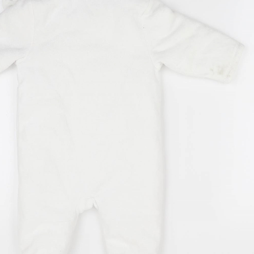 Brand and care label for Mothercare girls’ white animal print coverall one-piece, size 3-6, months