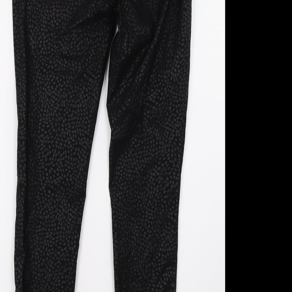 Brand and care label for TU women’s black animal print denim skinny jeans, size UK 10, 30-inch leg