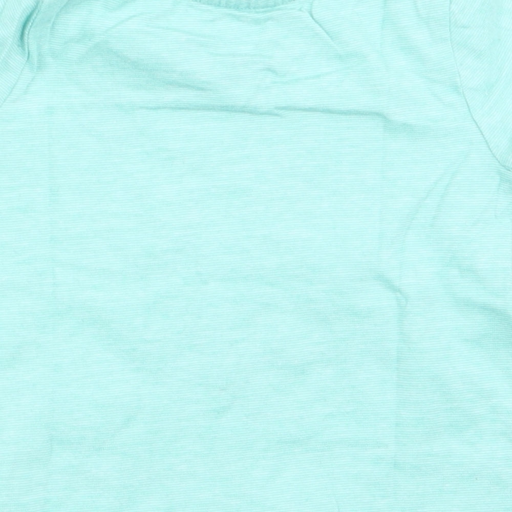 Brand and care label for F&F boys’ green basic t-shirt, size 3-6, months