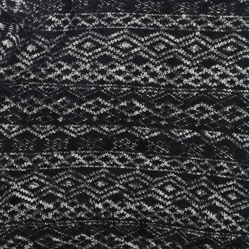 Brand and care label for C&A women’s black geometric jumper, size XS