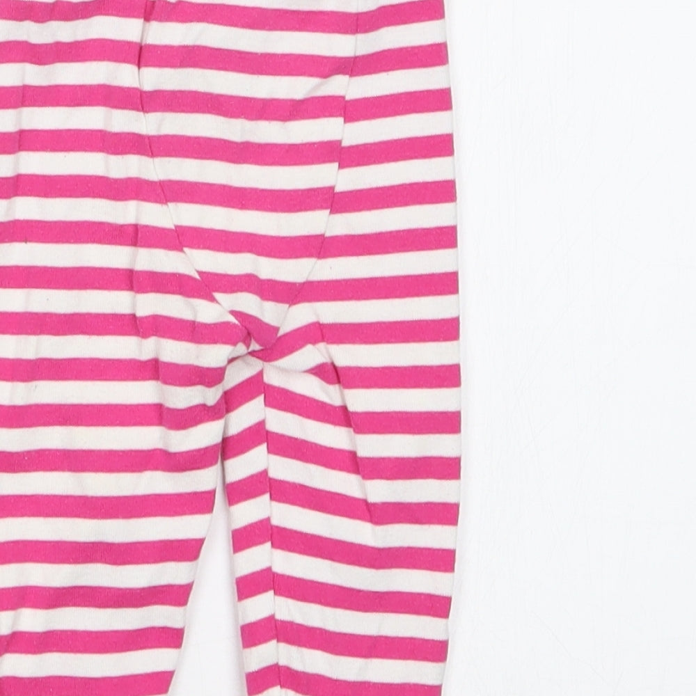 Brand and care label for Mothercare girls’ pink striped capri trousers, size 6-9, months