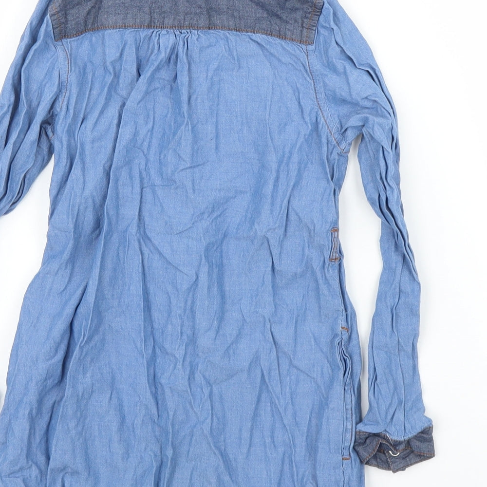 Brand and care label for H&M girls’ blue denim tunic blouse, size 5, years