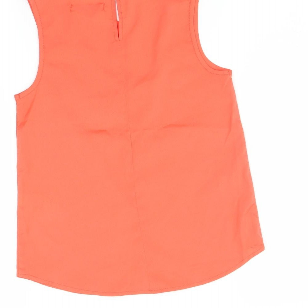 Brand and care label for Marks & Spencer girls’ orange camisole t-shirt, size 8-9, years