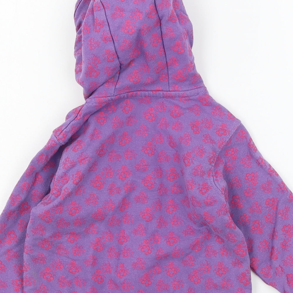 Brand and care label for STACCATO girls’ purple floral jersey jacket, size 12, months