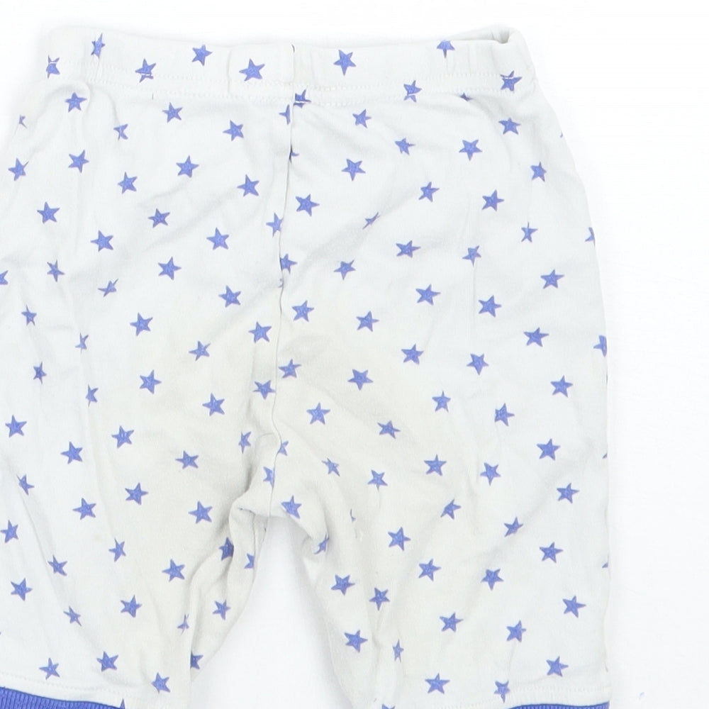 Brand and care label for John Lewis Baby White Geometric sweatpants, size 18-24, Months