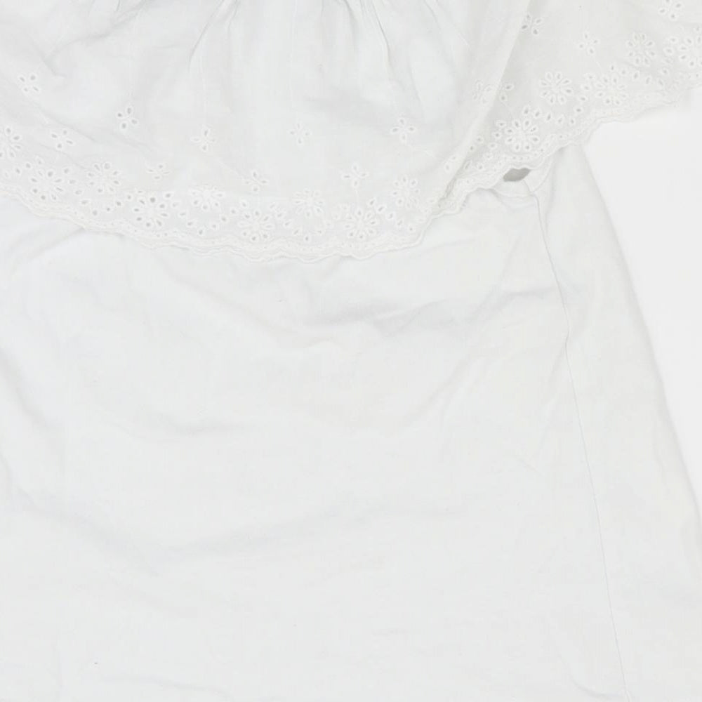 Brand and care label for Little Dickins and Jones girls’ white floral basic t-shirt, size 7-8, years