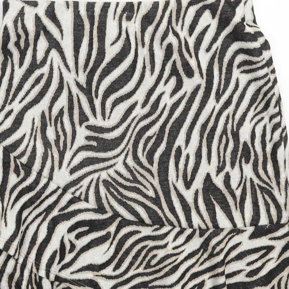 Brand and care label for Miss Selfridge women’s multicoloured animal print mini skirt, size UK 8