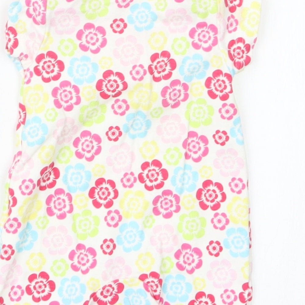 Brand and care label for F&F girls’ pink geometric coverall outfit/set size newborn