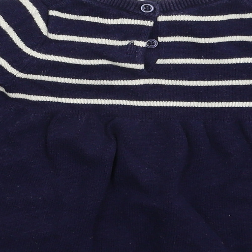 Brand and care label for Gap girls’ blue striped jumper dress, size 3-6, months