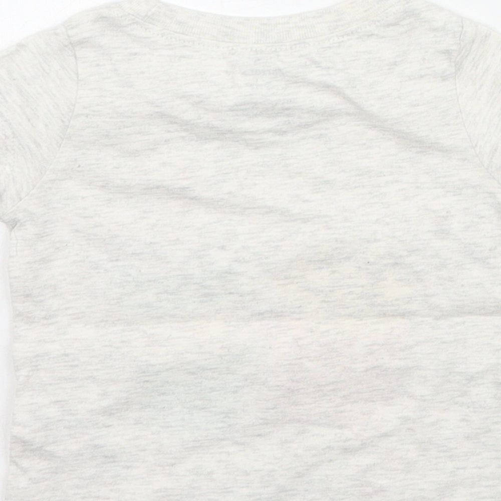 Brand and care label for Carters girls’ grey basic t-shirt, size 9-12, months