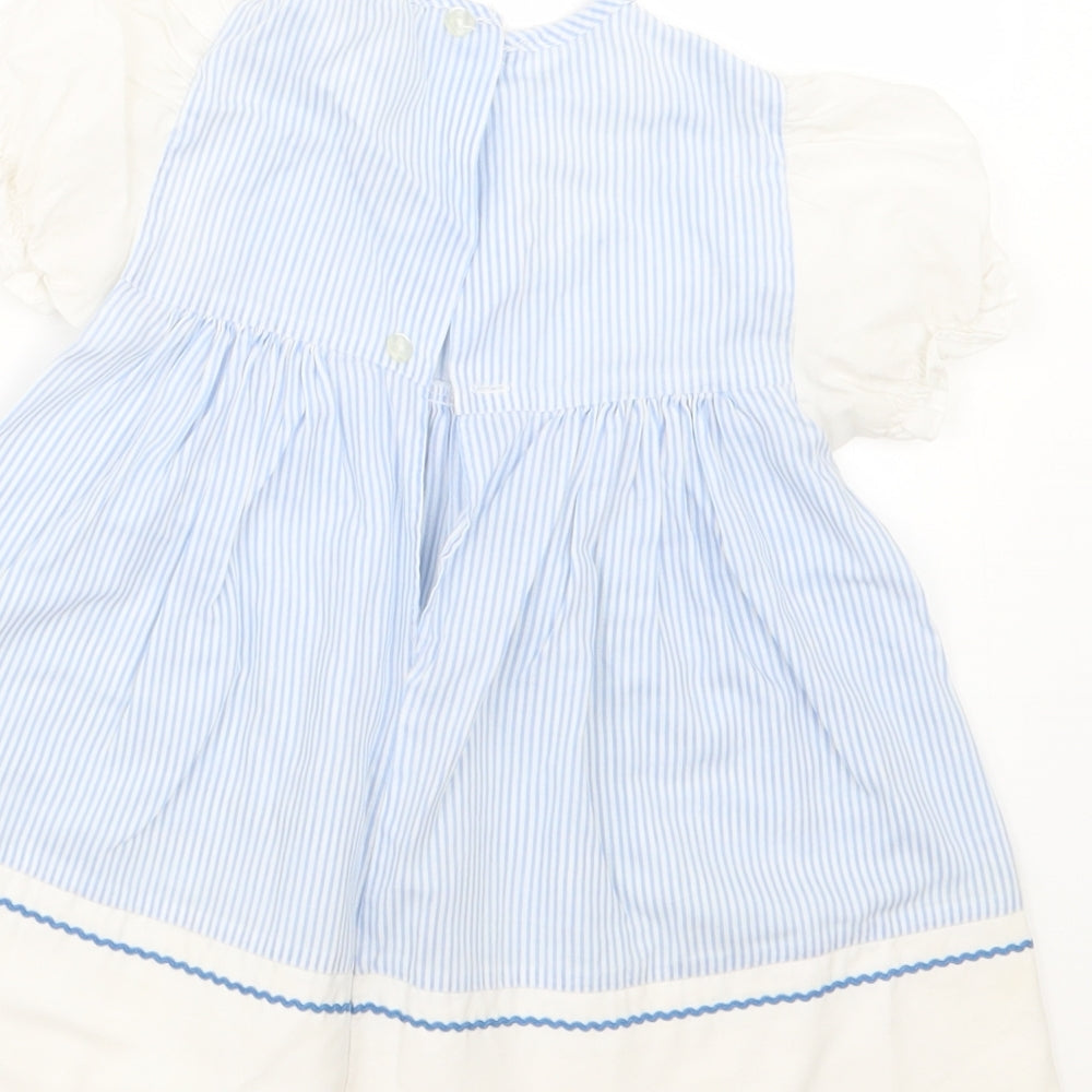 Brand and care label for Debenhams girls’ blue striped t-shirt dress, size 18, months