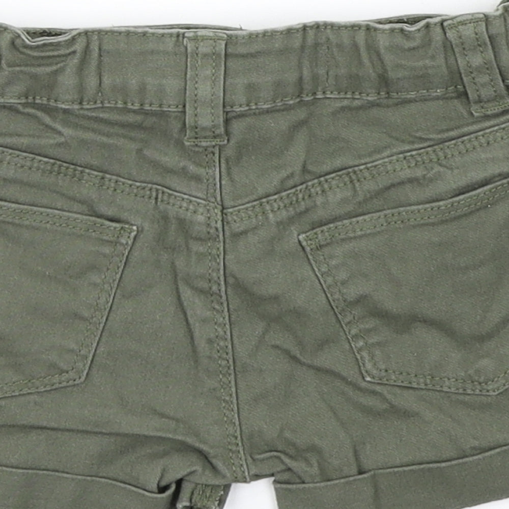 Brand and care label for Denim Co girls’ green denim cargo shorts, size 3-4, years