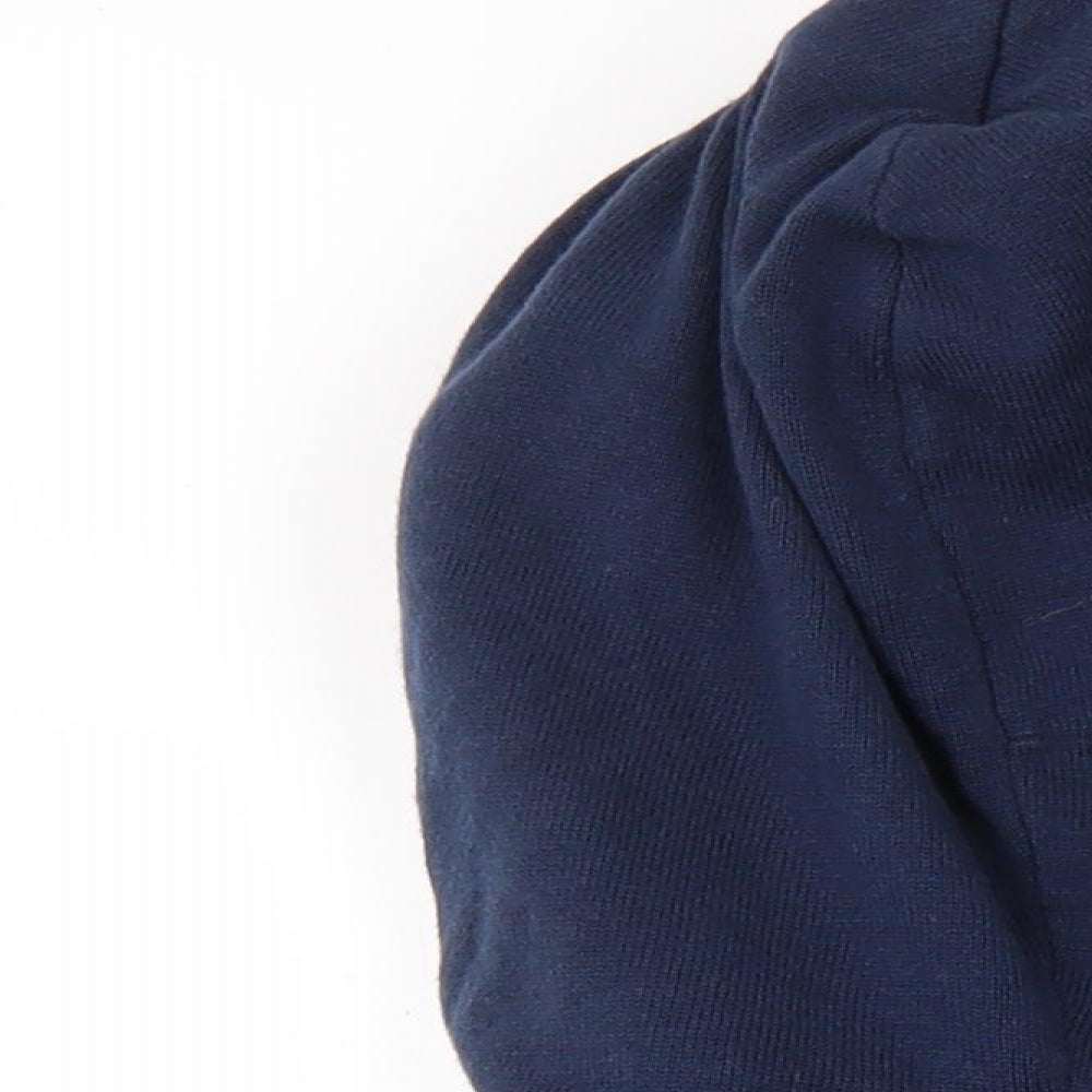 Brand and care label for QUICK SILVER boys’ blue jacket coat, size M