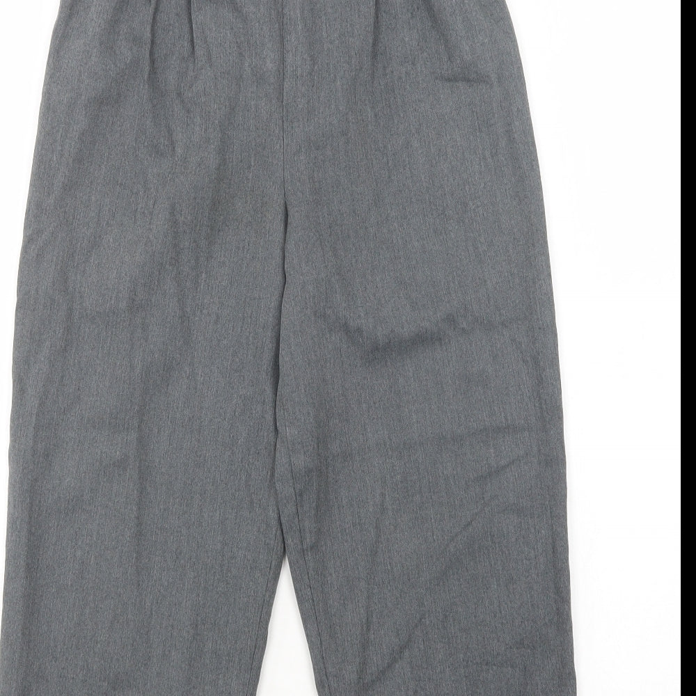 Brand and care label for Tesco boys’ grey polyester dress pants trousers, size 10, years regular button