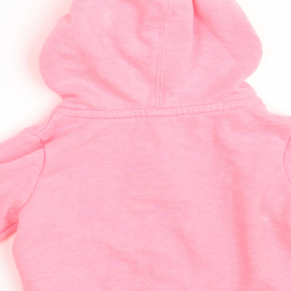 Brand and care label for Gap girls’ pink cotton jumper, size 6-9, months zip