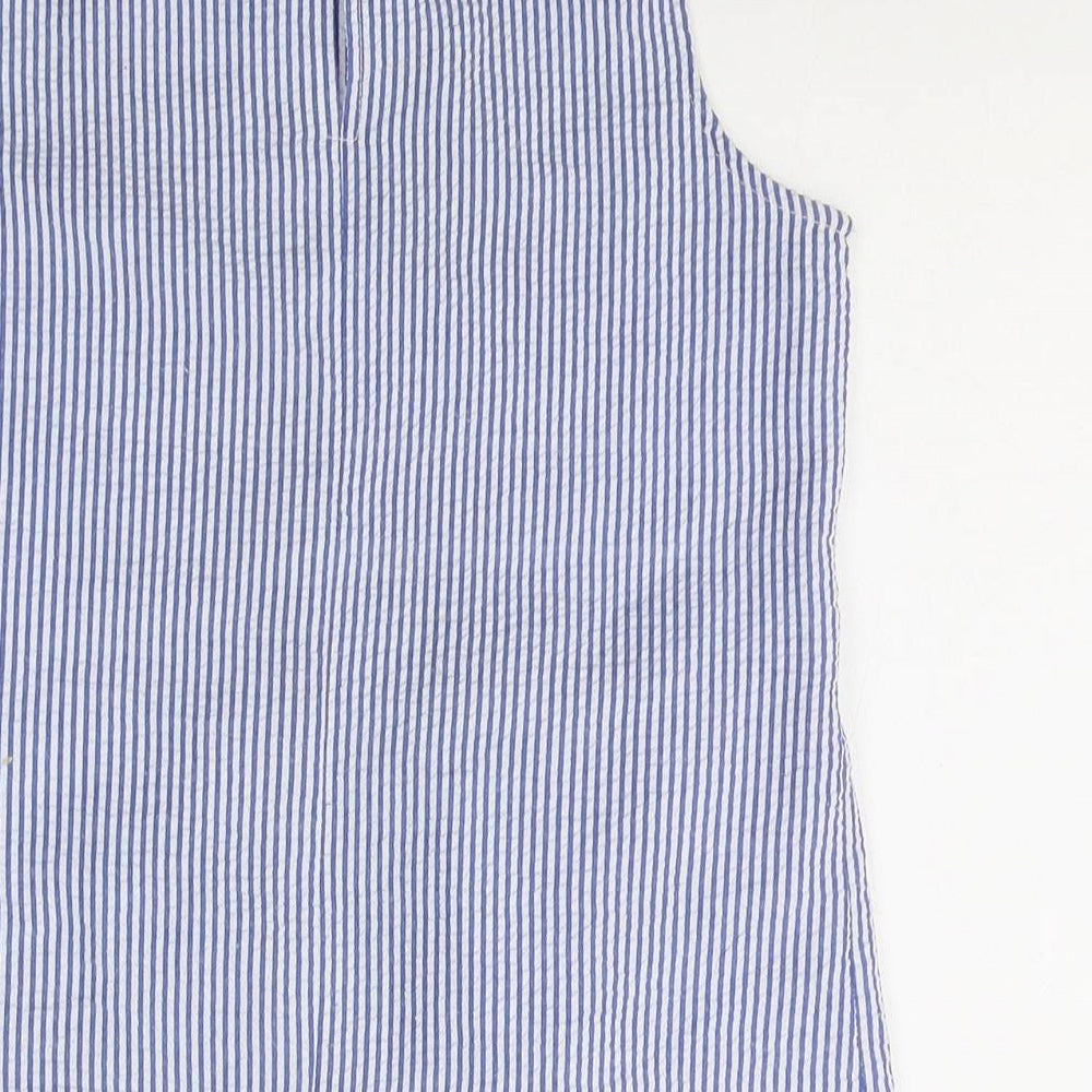Brand and care label for Alfred Dunner girls’ blue striped polyester basic tank, size 10-11, years round neck pullover