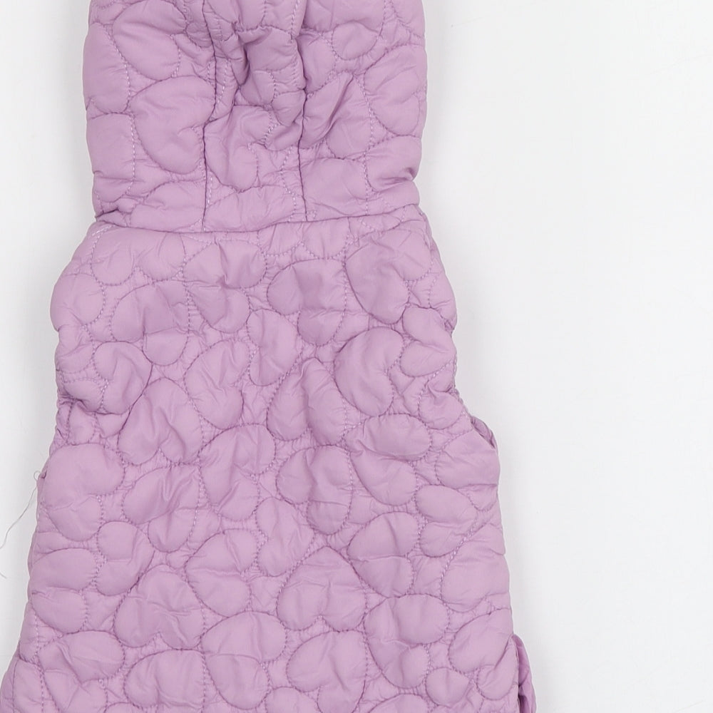 Brand and care label for Dunnes Stores girls’ purple gilet jacket, size 12-18, months