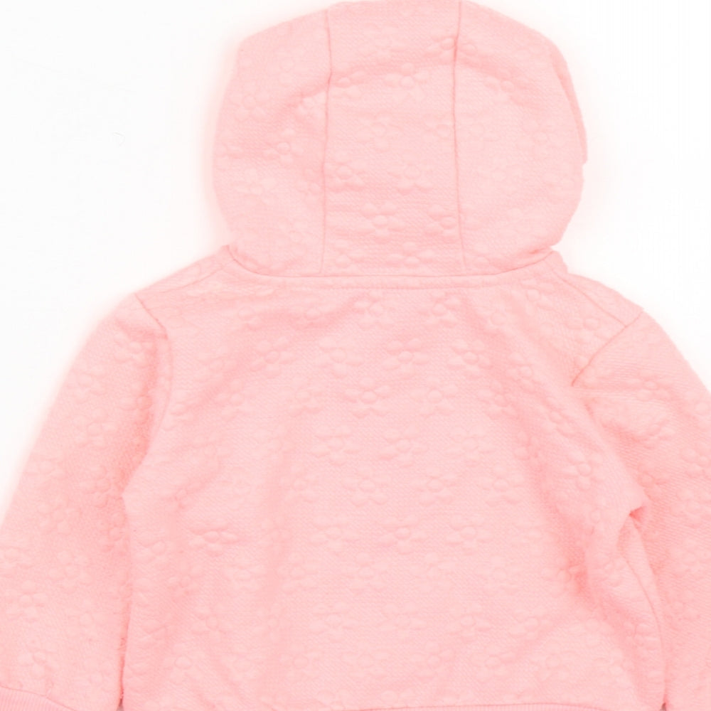 Brand and care label for Dunnes Stores girls’ pink polyester full zip jumper, size 12-18, months zip - flower detail