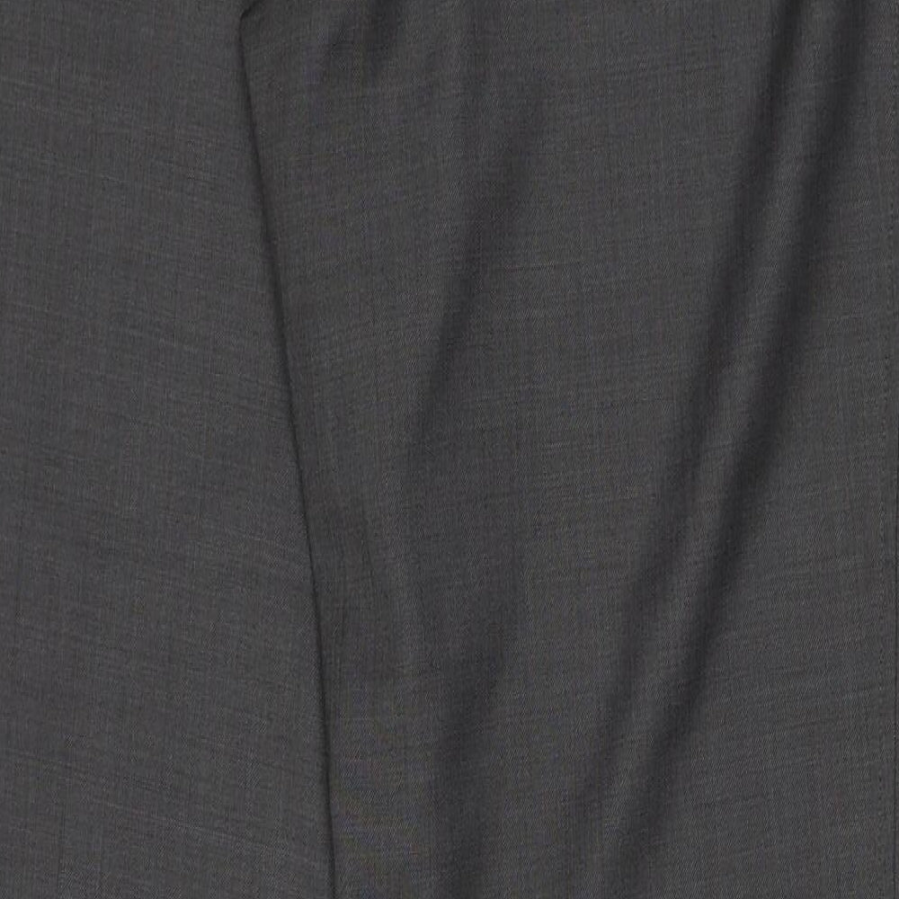 Brand and care label for NEXT women’s grey wool trousers, size UK 32, in regular zip