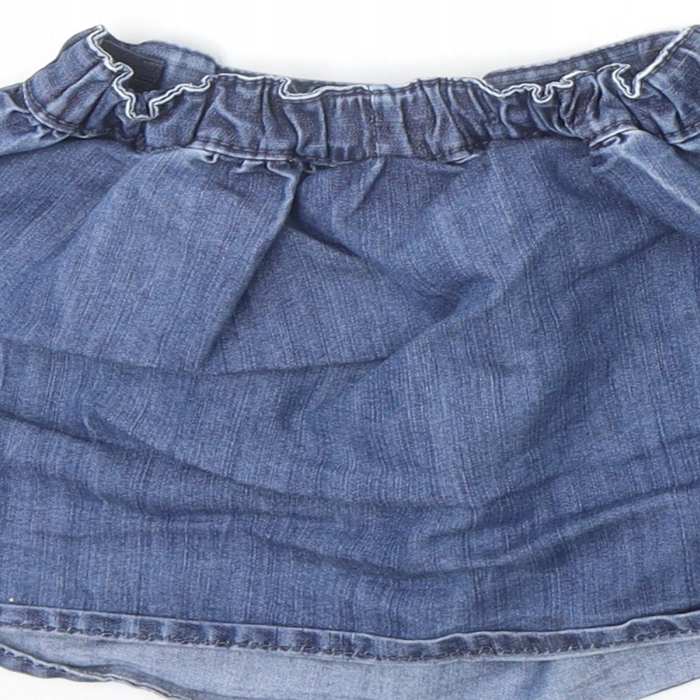 Brand and care label for Next girls’ blue cotton a-line skirt, size 18-24, months pullover