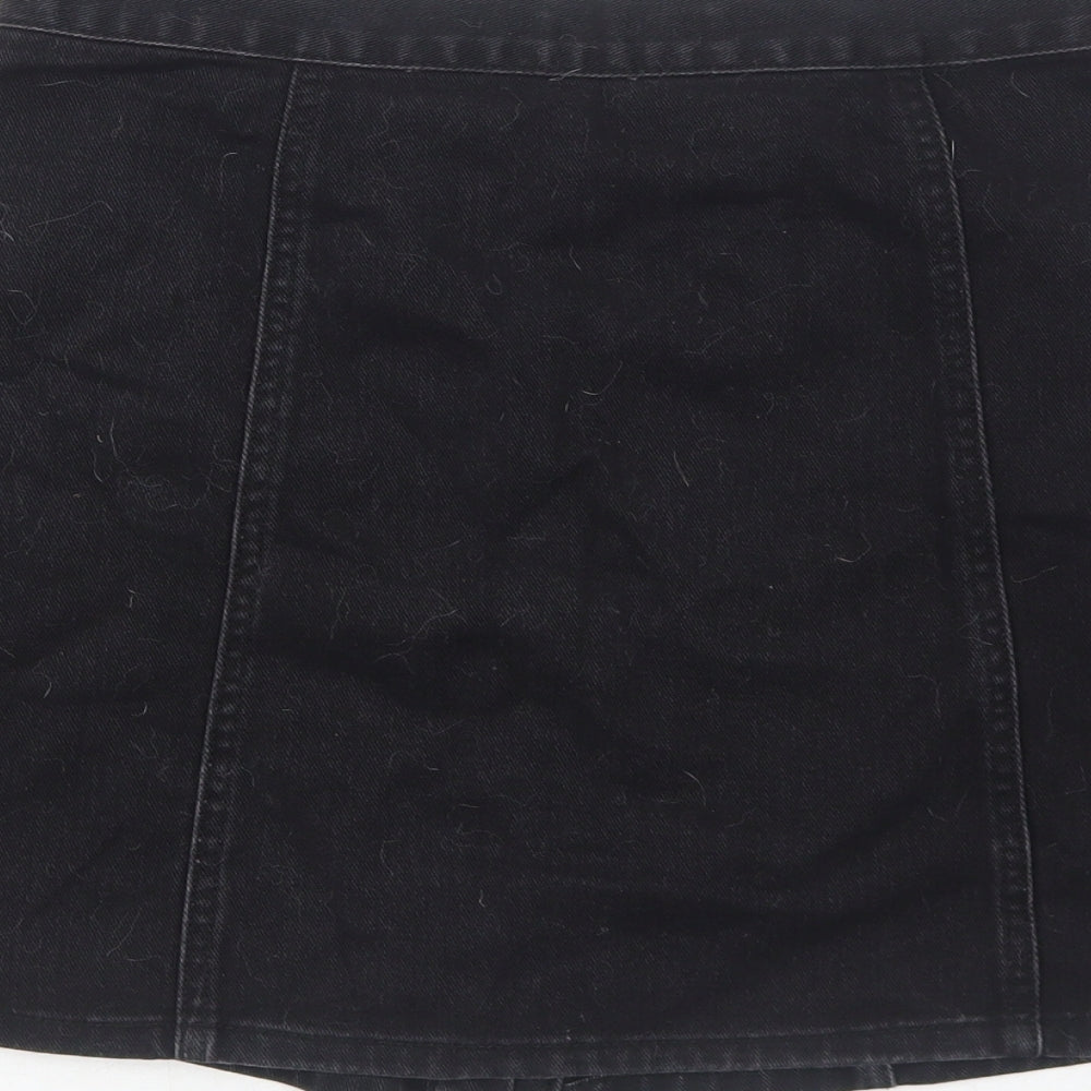 Brand and care label for Cooperative women’s black cotton a-line skirt, size M, snap