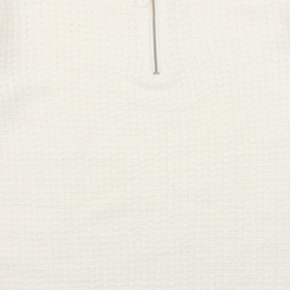 Brand and care label for Sfera women’s white round neck acrylic jumper, size M