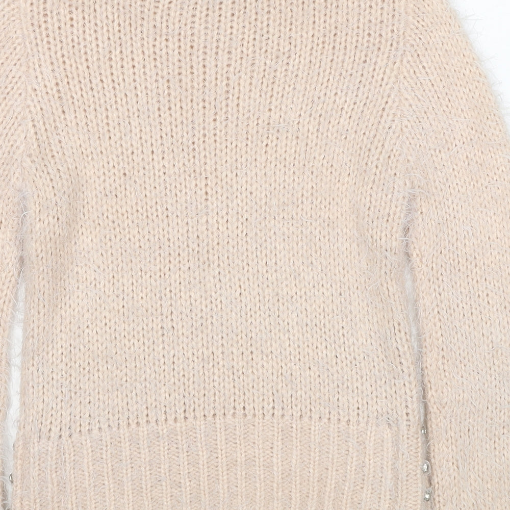 Brand and care label for Miss Selfridge women’s beige round neck acrylic jumper, size UK 6