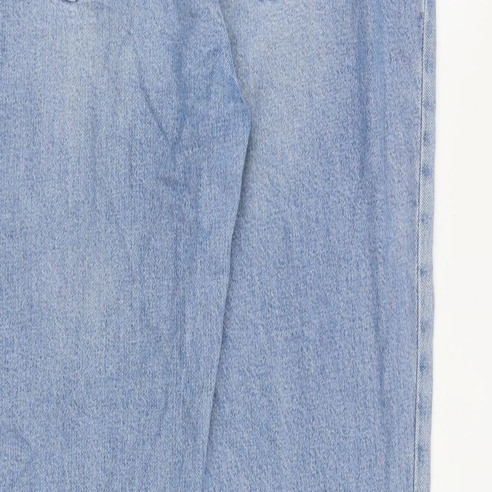 Brand and care label for ASOS women’s blue cotton bootcut jeans, size UK 34, in regular zip - distressed hems