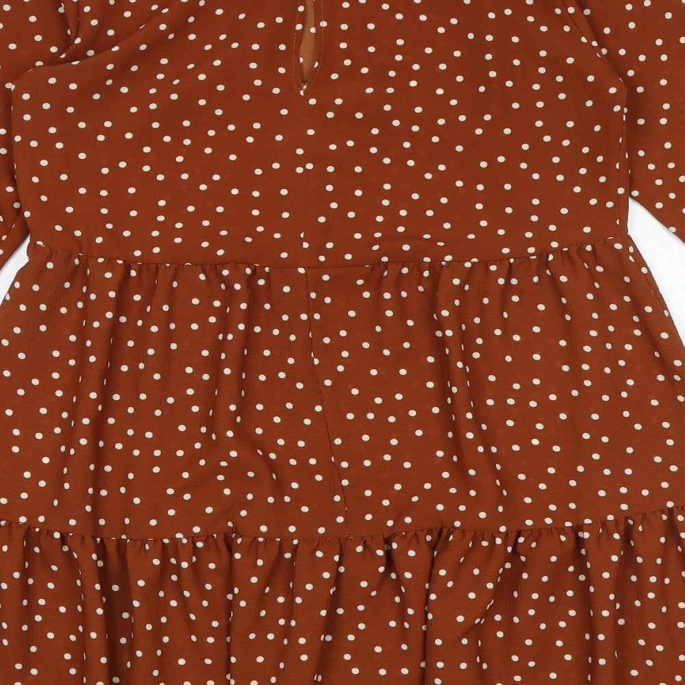 Brand and care label for ASOS women’s brown polka dot polyester skater dress, size UK 8, round neck button