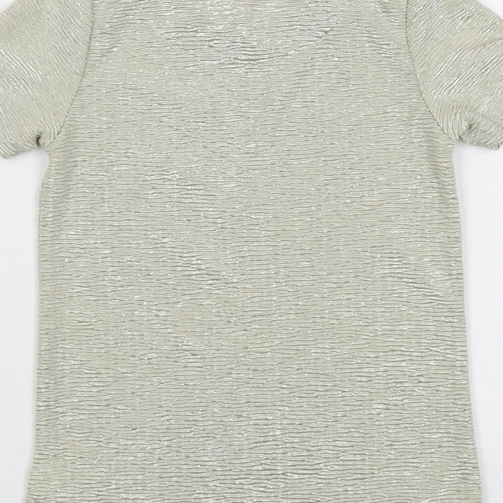 Brand and care label for John Lewis girls’ gold polyester basic t-shirt, size 6, years round neck pullover - textured