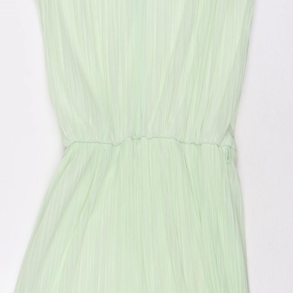 Brand and care label for Miss Selfridge women’s green polyester trapeze & swing, size UK 10, round neck button
