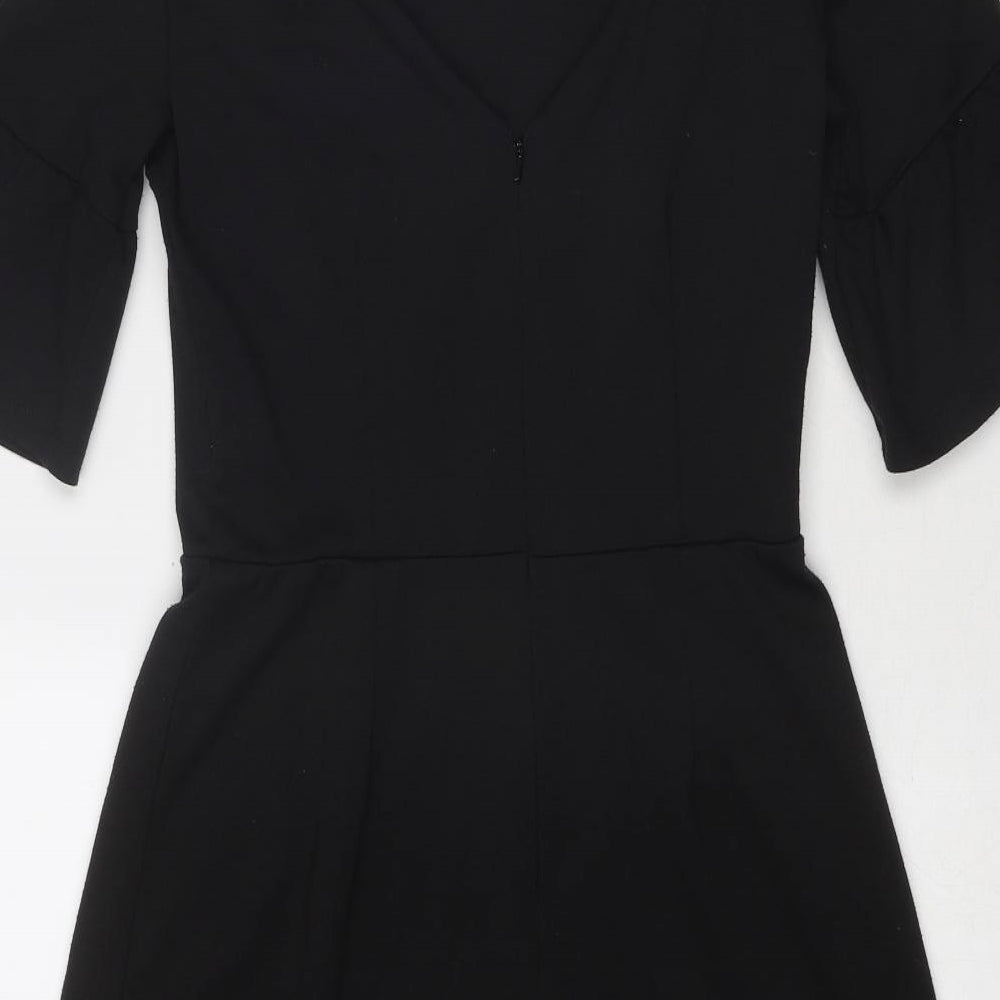Brand and care label for ASOS women’s black polyester trapeze & swing, size UK 10, round neck zip