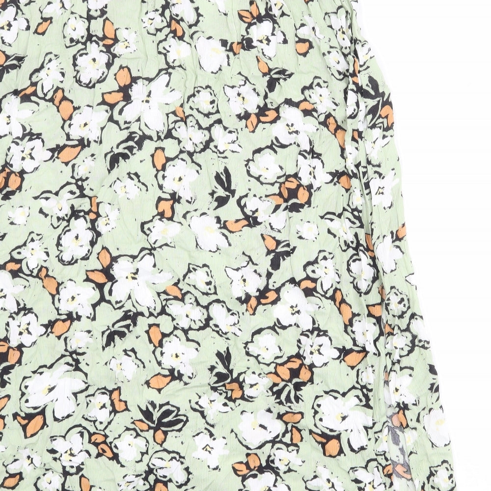 Brand and care label for ICHI women’s green floral viscose peasant skirt, size UK 34, in