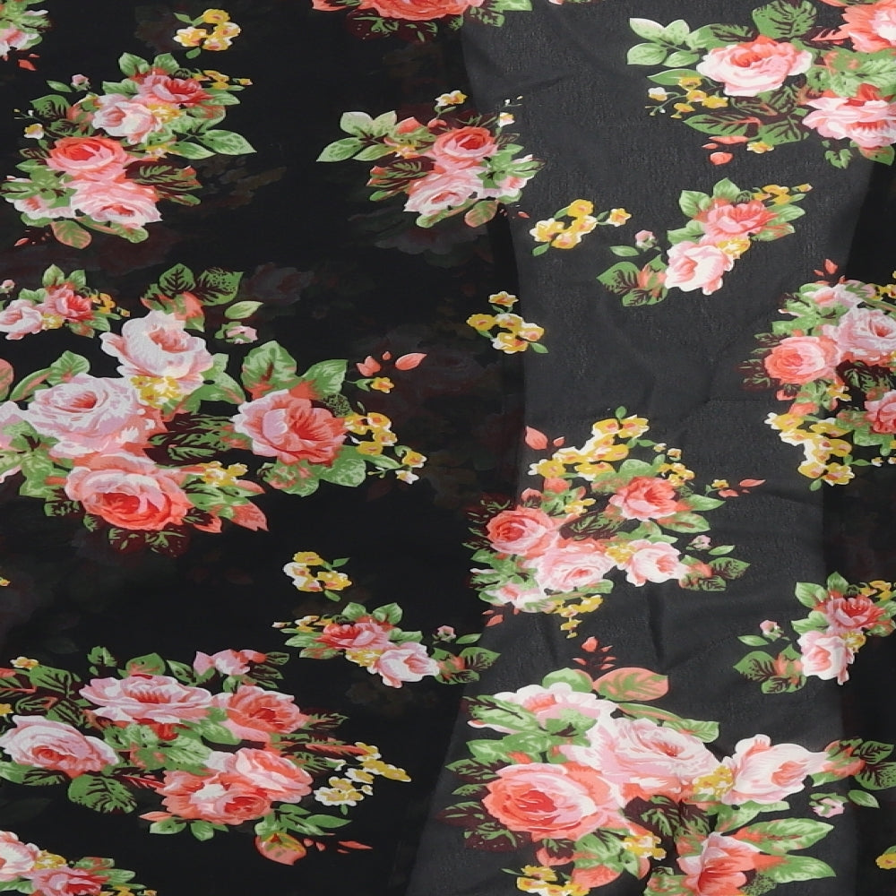 Brand and care label for New Look girls’ black floral polyester kimono blouse, size M, v-neck
