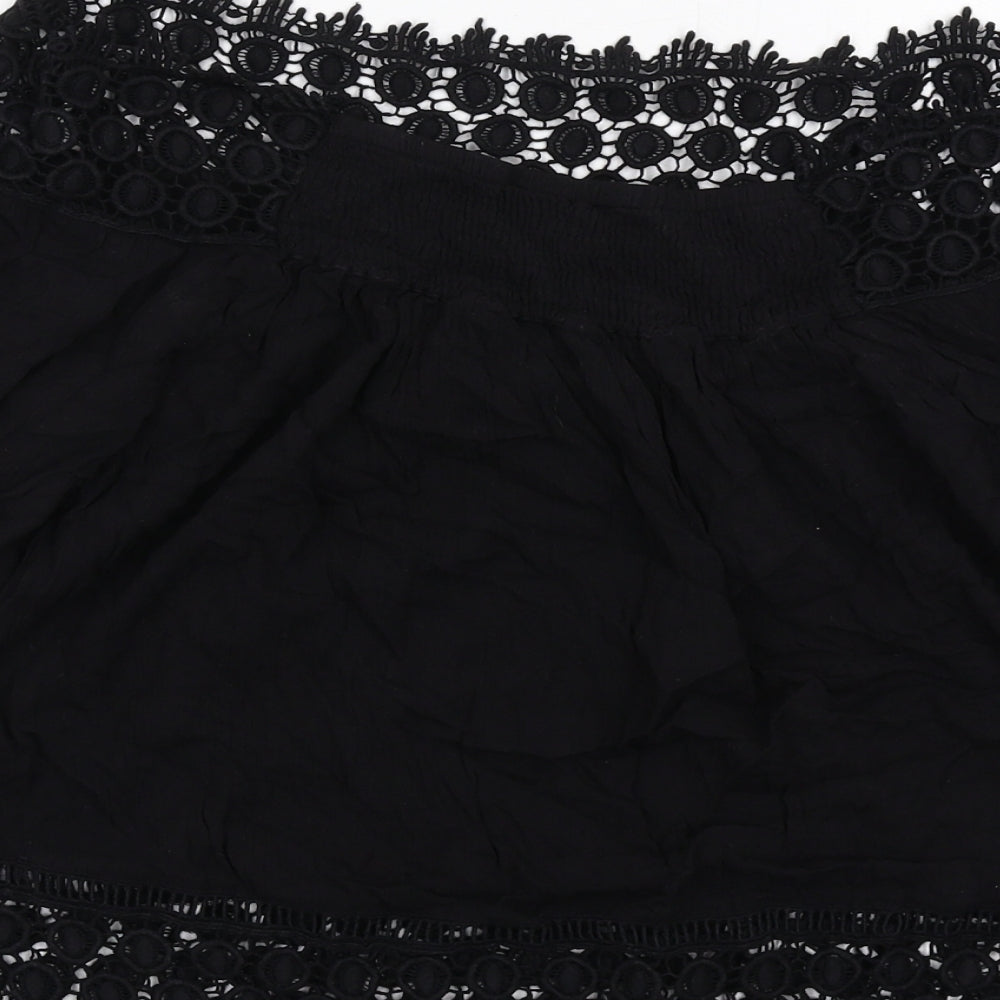 Brand and care label for Miss Selfridge women’s black viscose basic blouse, off the shoulder - crocheted lace trim