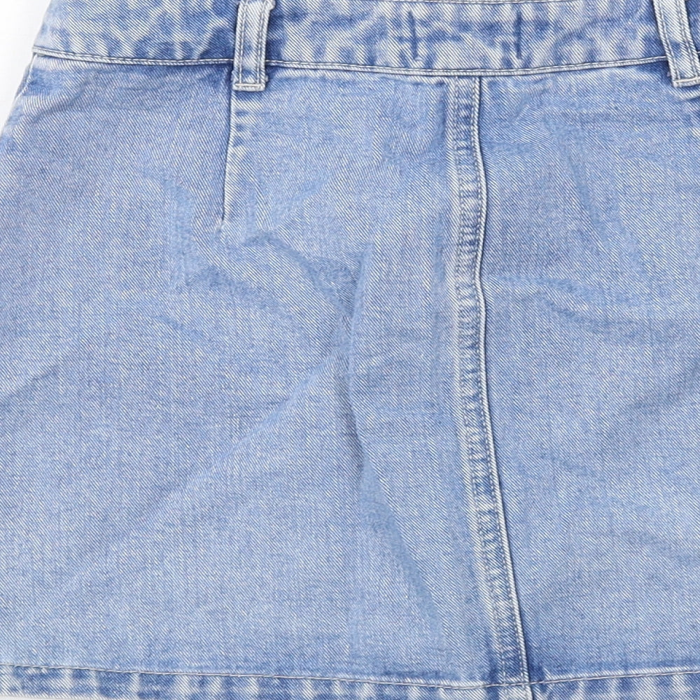 Brand and care label for Miss Selfridge women’s blue cotton a-line skirt, size UK 6, button