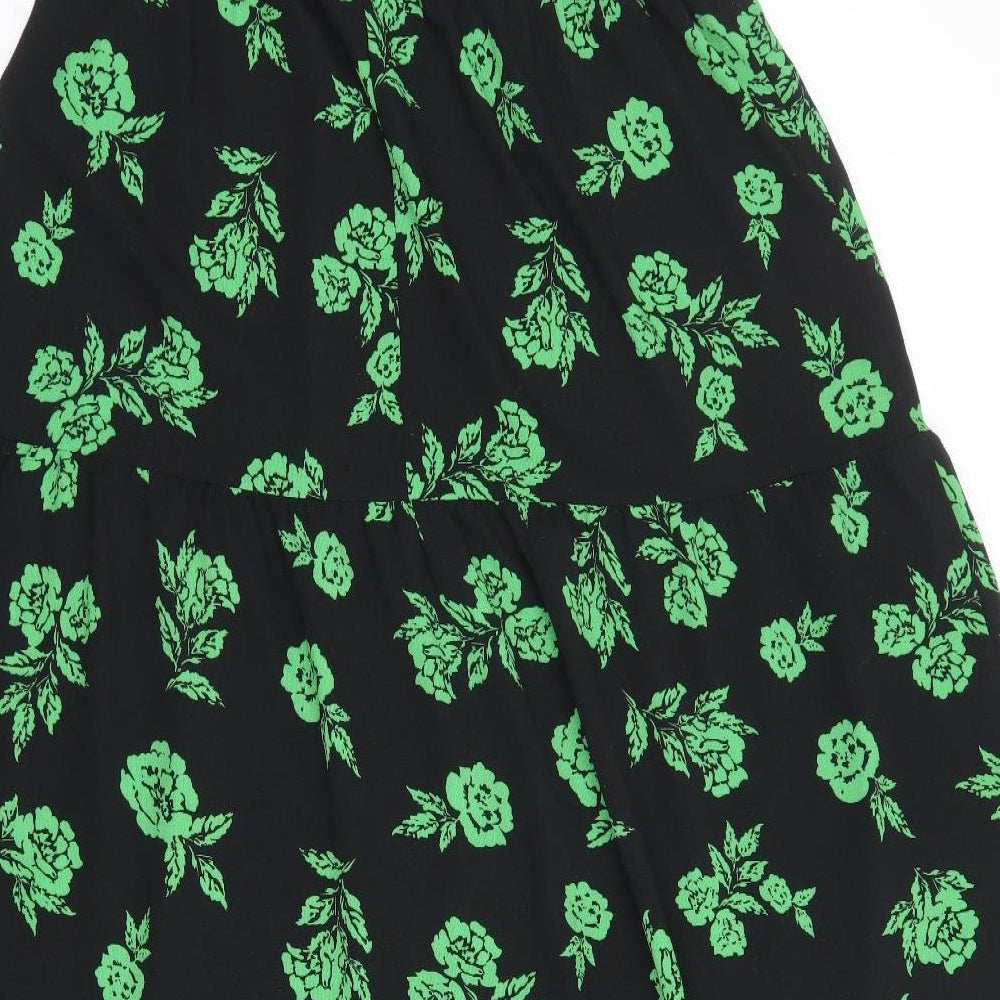 Brand and care label for ASOS women’s black floral polyester a-line, size UK 12, round neck button
