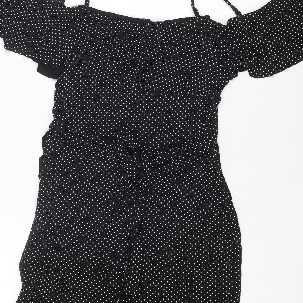 Brand and care label for I SAW IT FIRST women’s black polka dot viscose a-line, size UK 8, v-neck pullover - cold shoulder