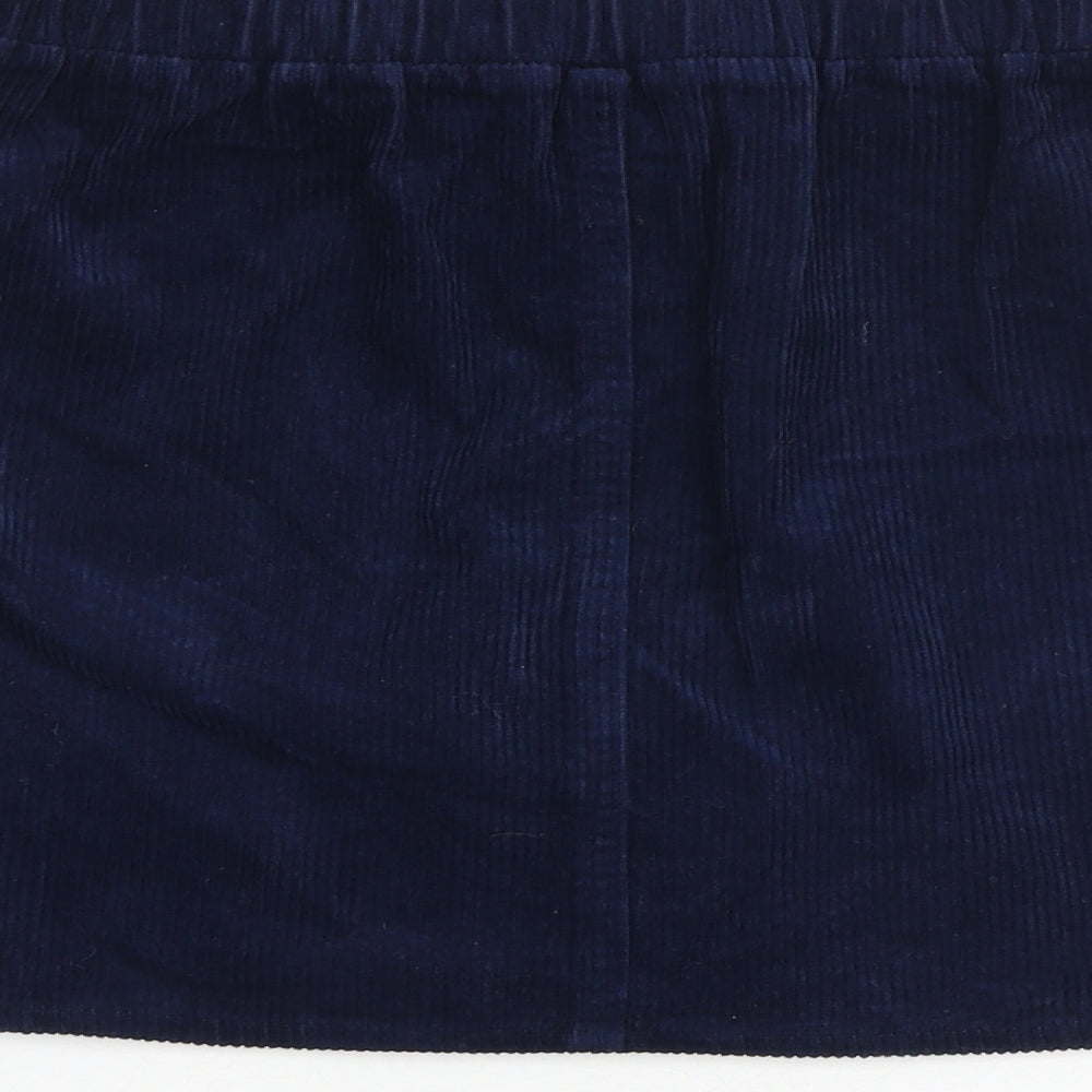 Brand and care label for Denim & Co. girls’ blue 100% cotton mini skirt, size 11-12, years regular buckle