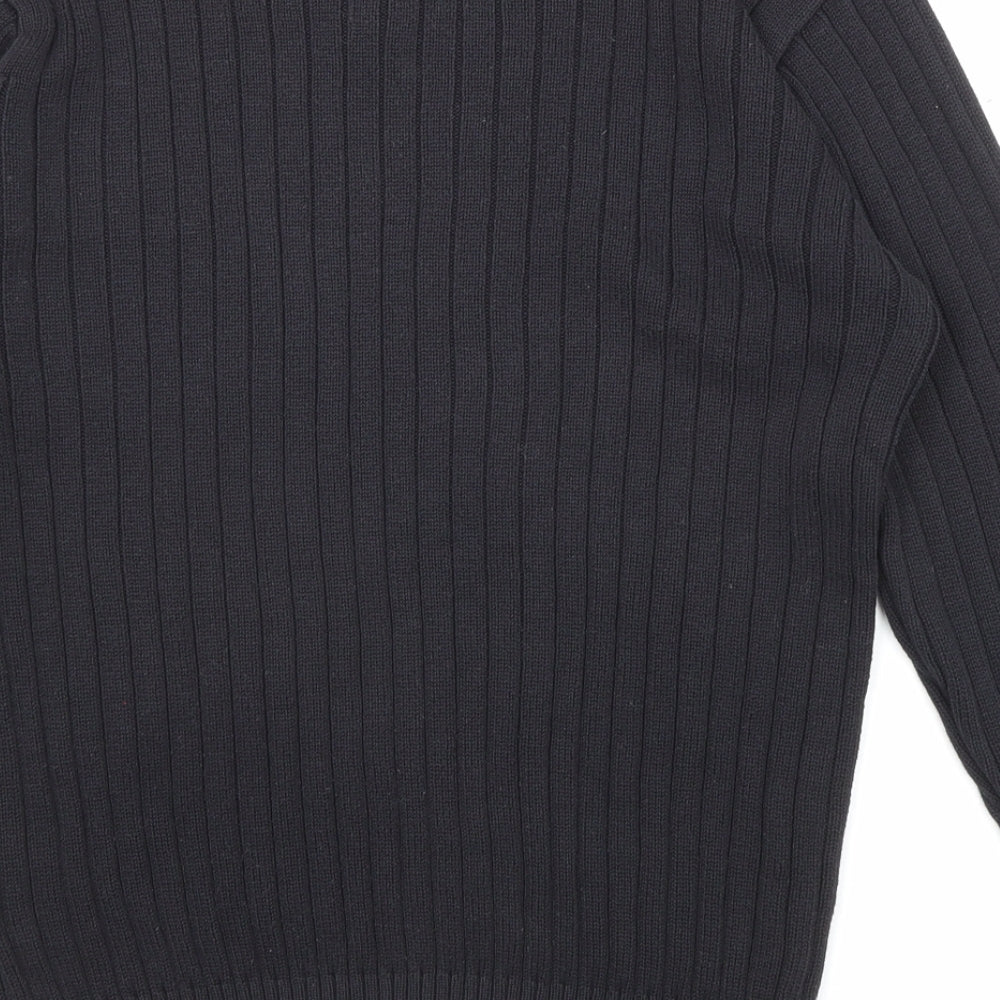 Brand and care label for C&A women’s black v-neck acrylic jumper, size M