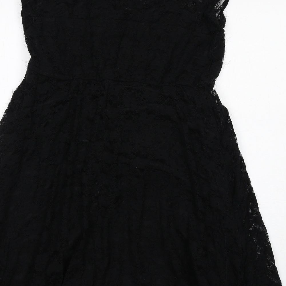 Brand and care label for ASOS women’s black floral nylon shift, size UK 14, round neck pullover