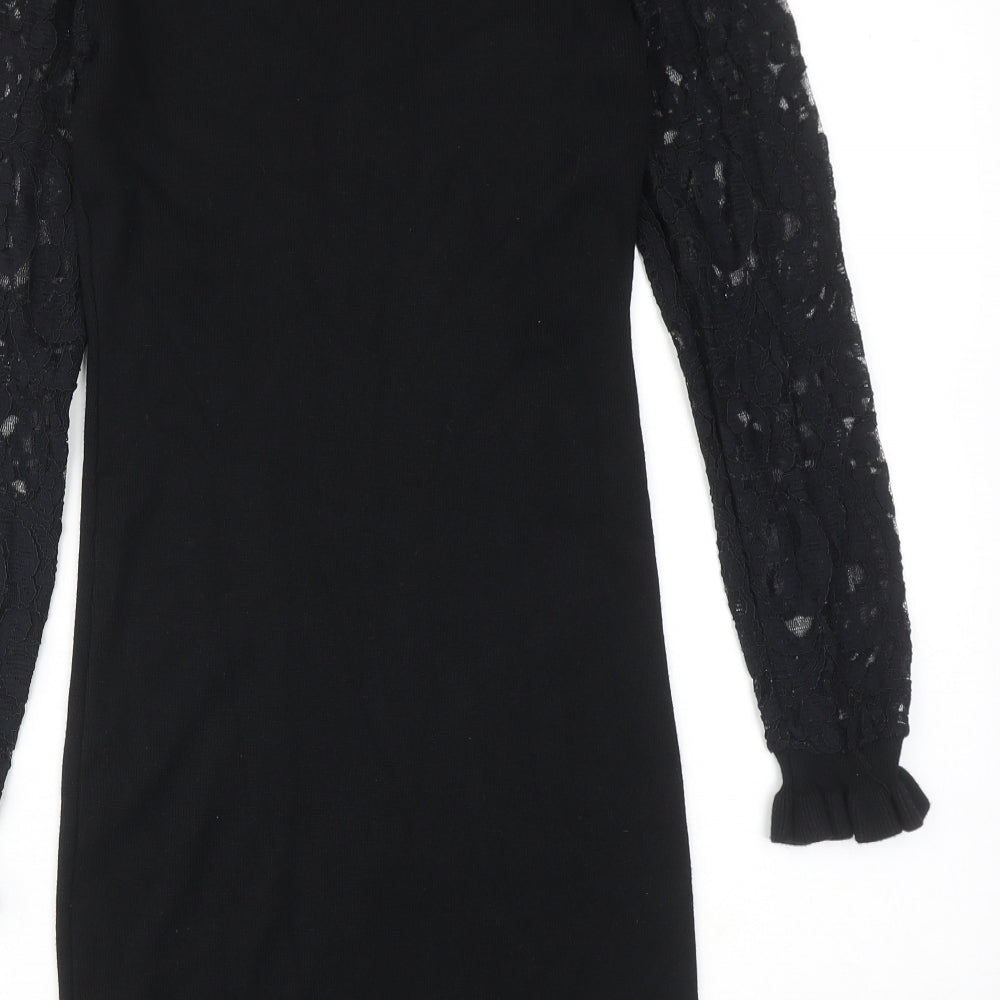 Brand and care label for Wild Flower women’s black viscose a-line, size M, round neck pullover