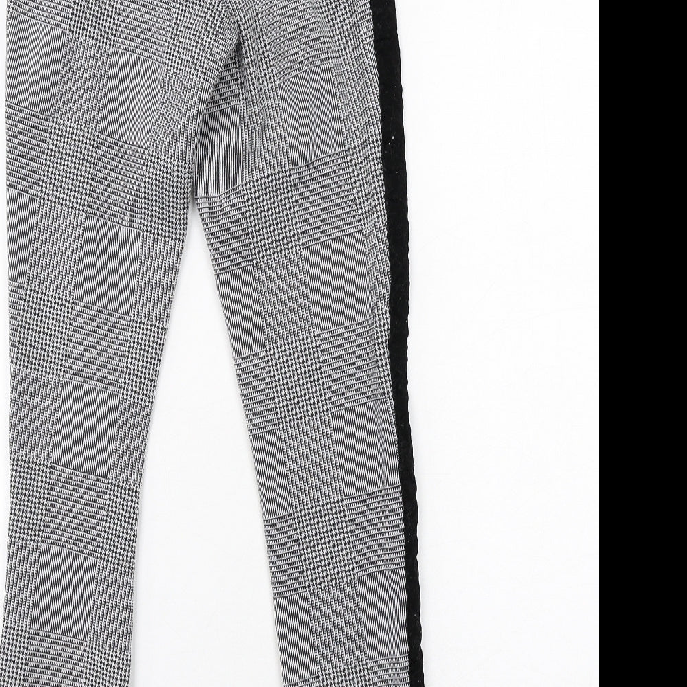 Brand and care label for ASOS women’s grey plaid polyester trousers, size UK 4, regular